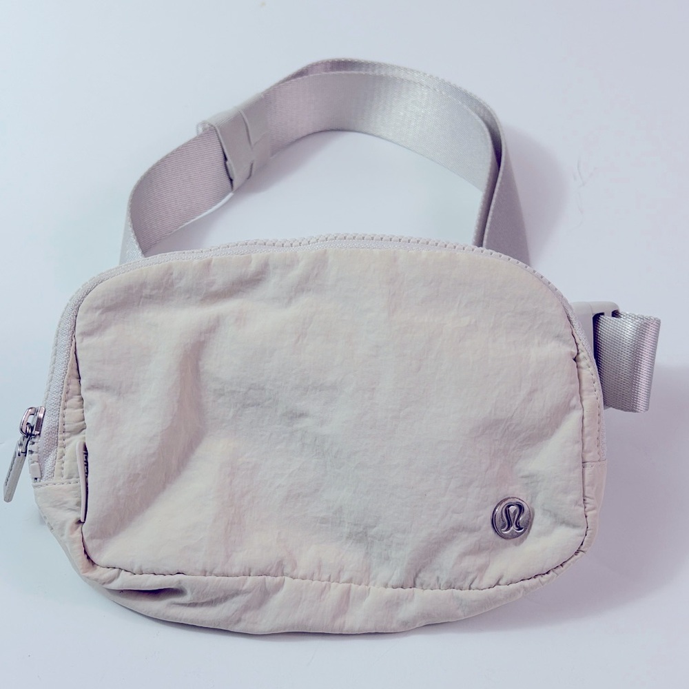 Lululemon Stone colored Belt Bag, 5x8” w adjustable belt.